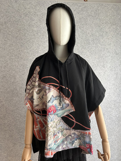 Black hooded kimono poncho with crane and pine design, front view
