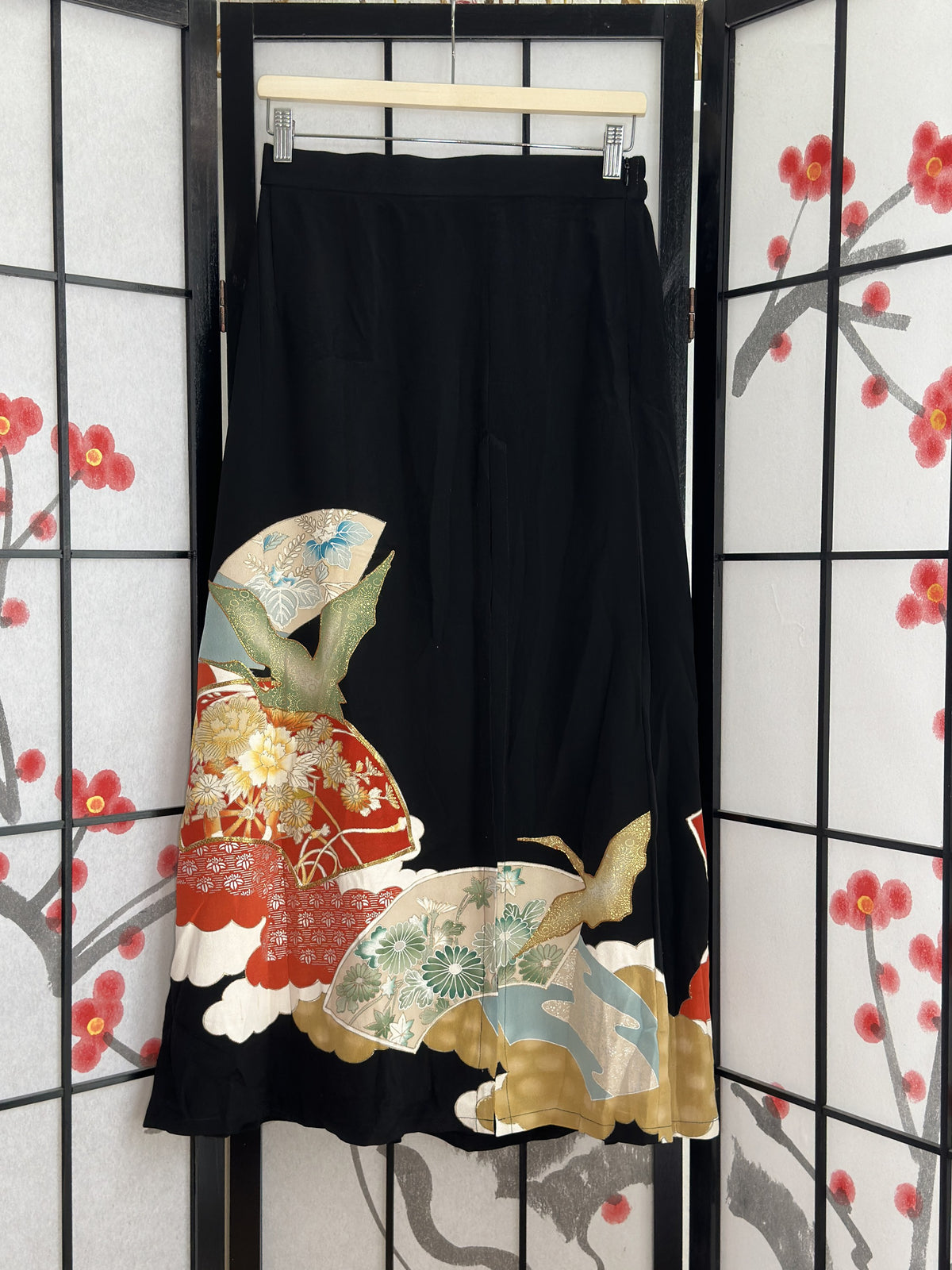 Black high slit kimono skirt with red fans and birds, front view