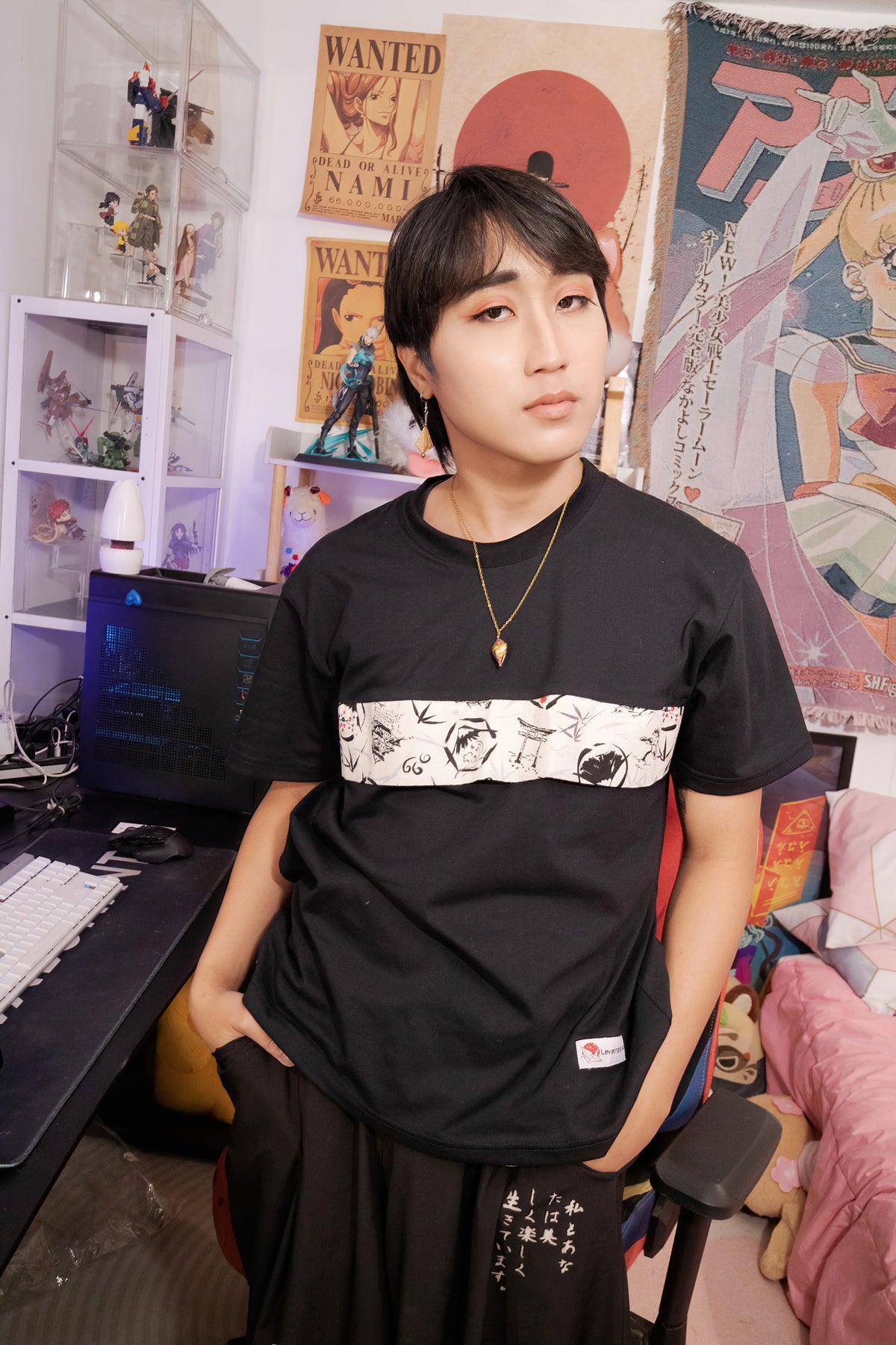 Model wearing the unisex t-shirt loose fit with traditional Japanese fabric trim