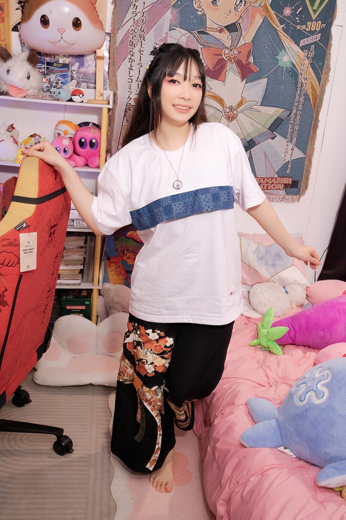 Model wearing the unisex t-shirt loose fit with traditional Japanese fabric trim