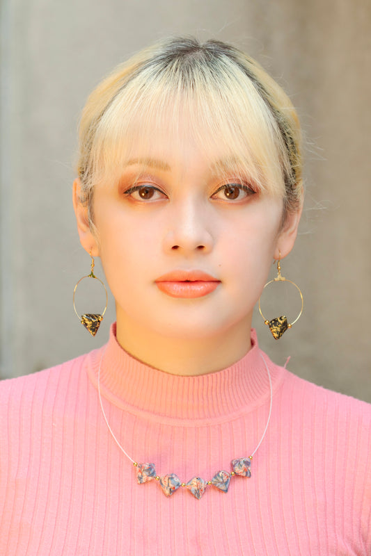 Model wearing the Sonobe Abstract Necklace