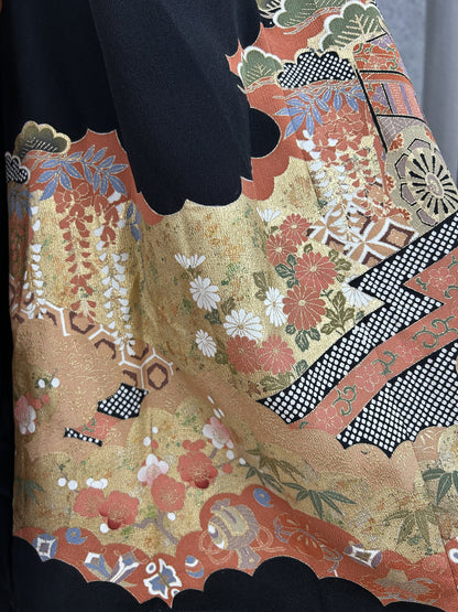 Black upcycled kimono palazzo pants, close-up of chrysanthemums, plum blossoms and lattice bands