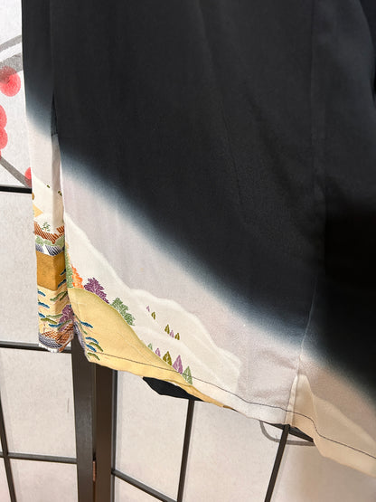 Floral-patterned fabric draped over a black metal frame