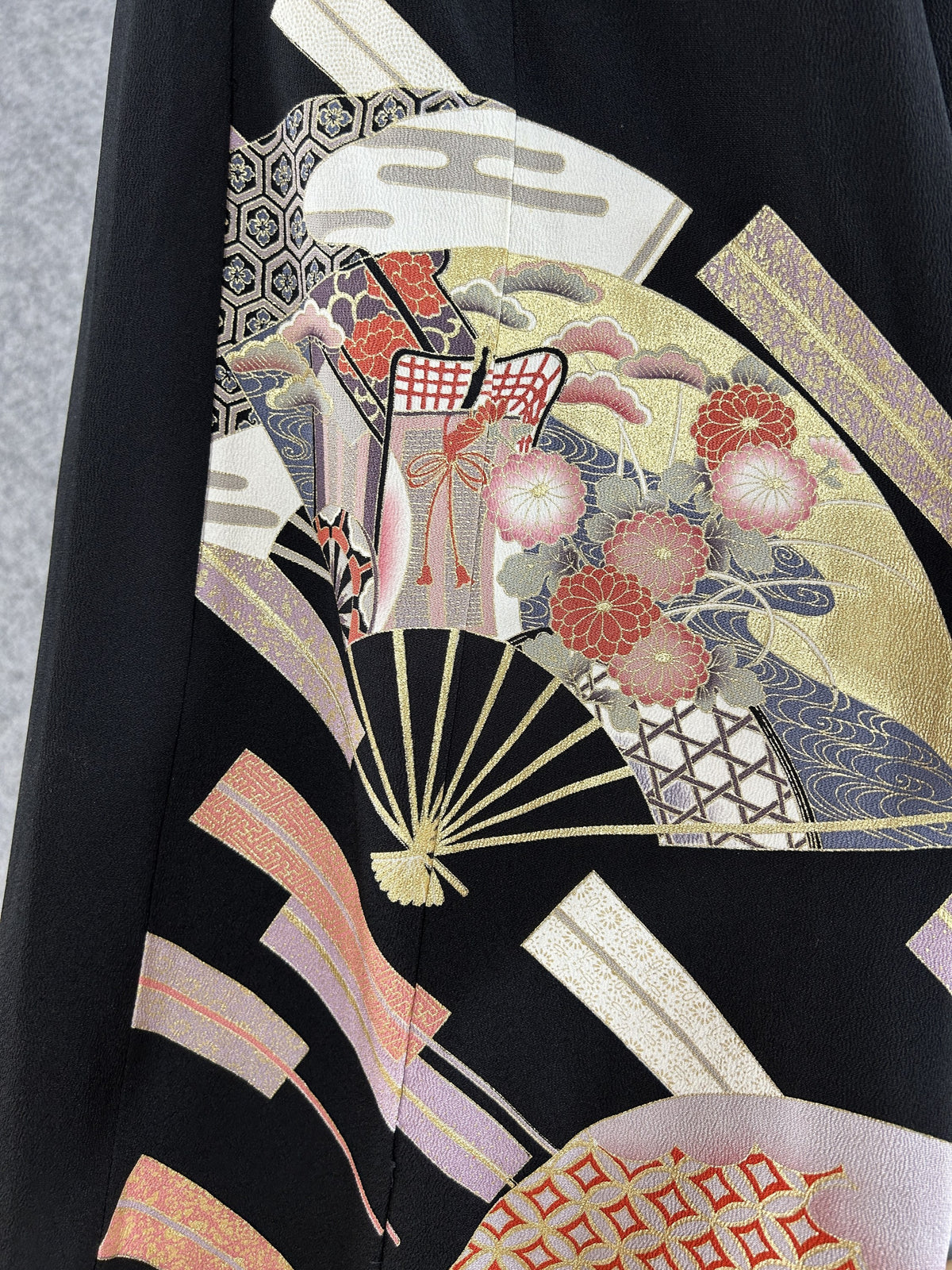 Black upcycled kimono palazzo pants, detail of folding fans with chrysanthemums and lattice