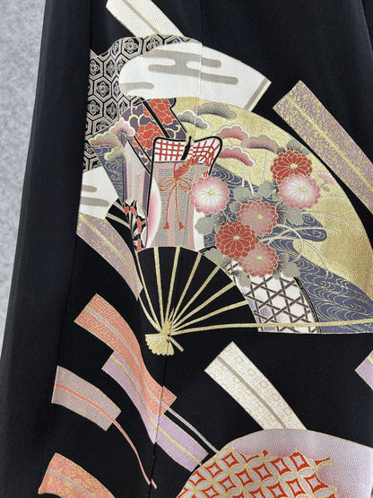 Black upcycled kimono palazzo pants, detail of folding fans with chrysanthemums and lattice