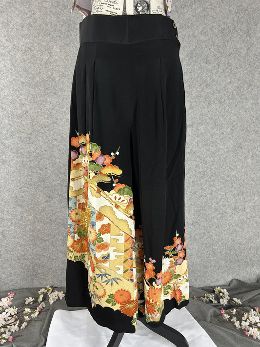 Black upcycled kimono palazzo pants with cream and gold cloud panels of chrysanthemums, front view