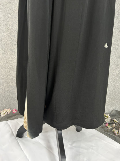 Black upcycled kimono palazzo pants with small white crest, back view
