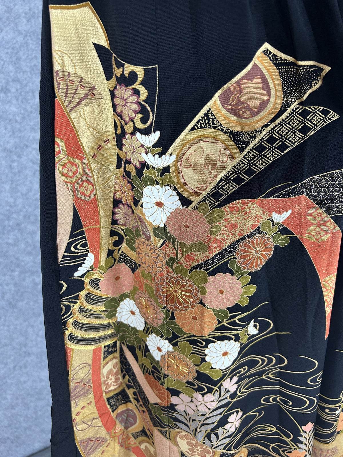 Black upcycled kimono palazzo pants, close-up of gold fans, bands and chrysanthemums