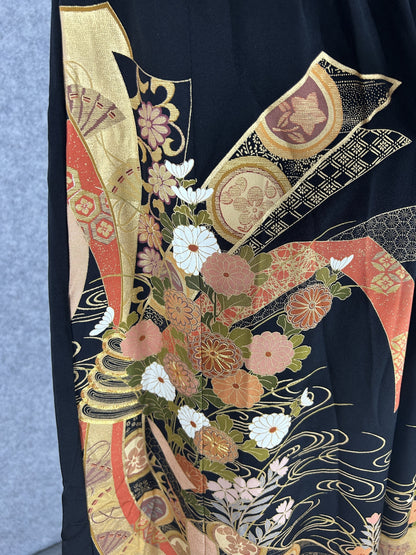 Black upcycled kimono palazzo pants, close-up of gold fans, bands and chrysanthemums