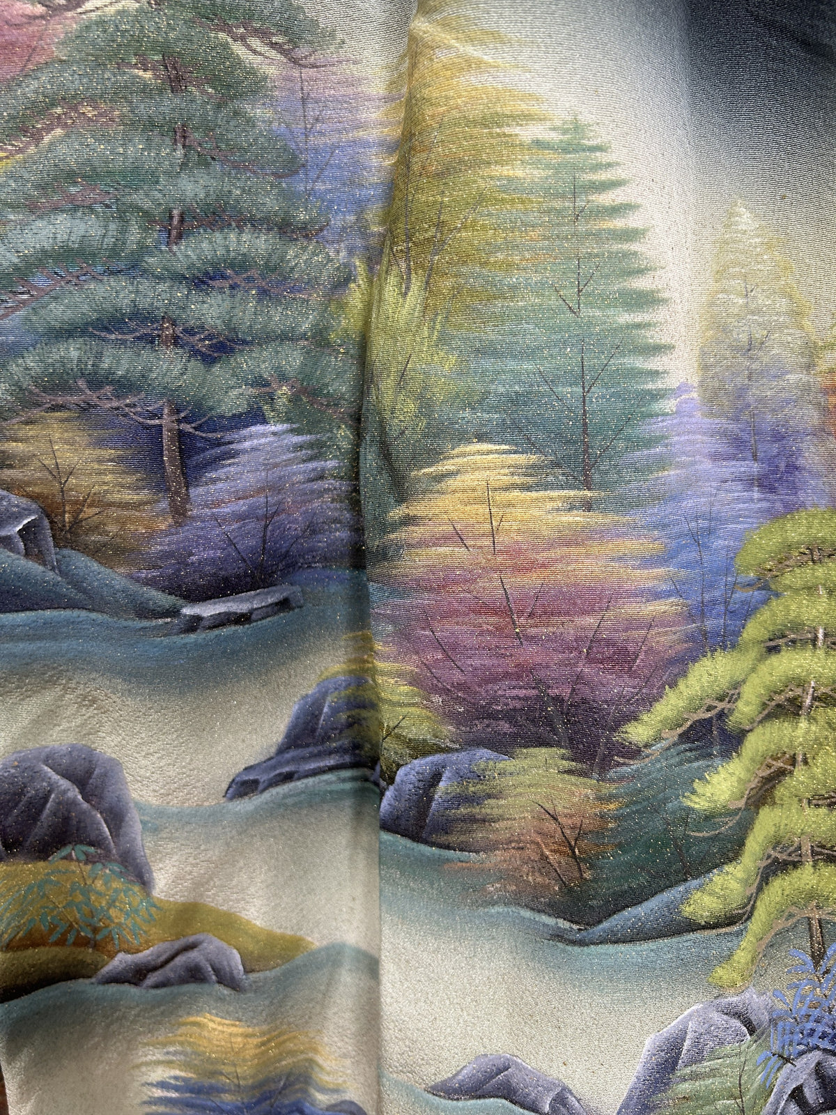 Black upcycled kimono palazzo pants, close-up of lilac and yellow-green trees and pines