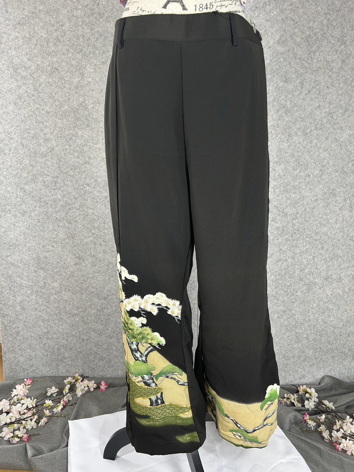 Black upcycled tomesode kimono wide leg pants with a pine tree on gold, front view
