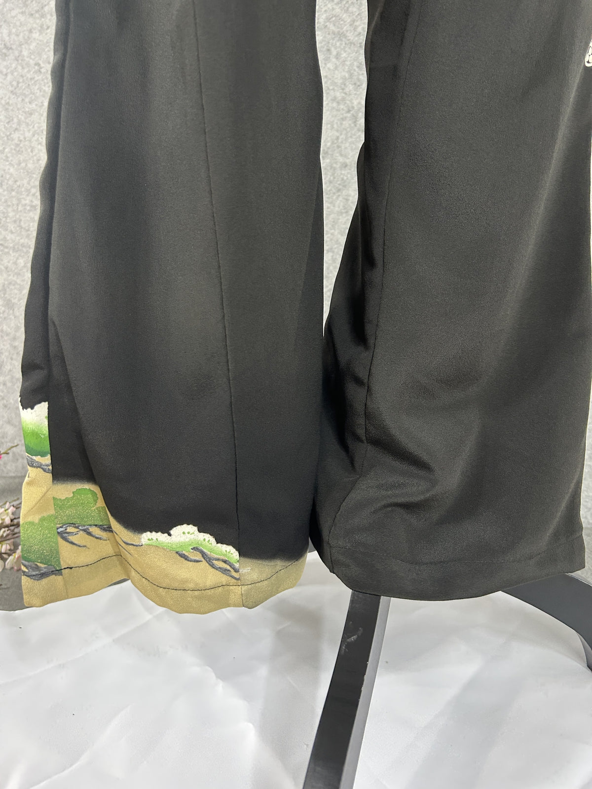 Black upcycled tomesode kimono wide leg pants with a pine tree on gold, back view