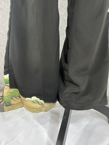 Black upcycled tomesode kimono wide leg pants with a pine tree on gold, back view