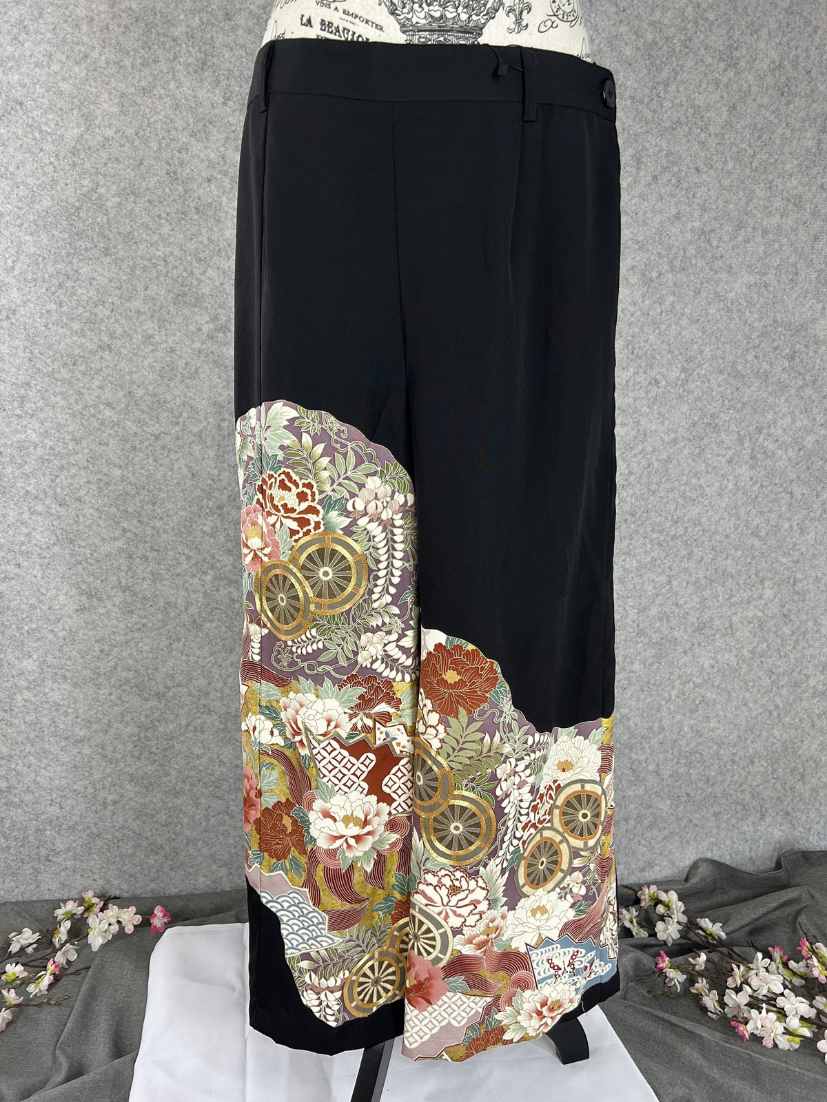 Black upcycled tomesode kimono wide leg pants with gold wheels and peonies on mauve, front view