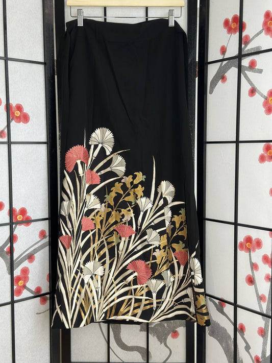 Black kimono wrap skirt with white, pink and gold flowers, full view
