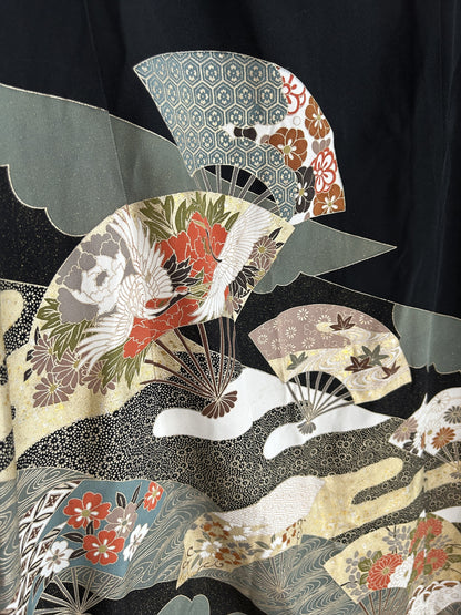 Black kimono wrap skirt, detail of folding fans with red flowers
