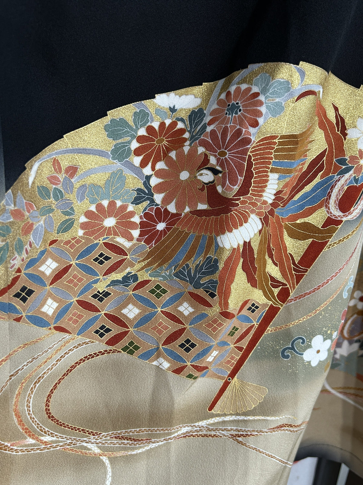 Black kimono wrap skirt, close-up of bird, chrysanthemums and patterned fan