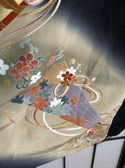Black kimono wrap skirt, detail of lilac fan with maple leaves on beige