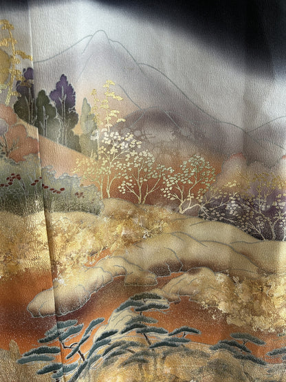 Black kimono wrap skirt, detail of golden trees, hills and pines