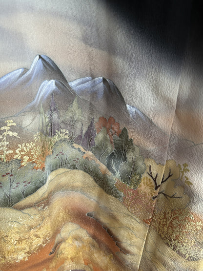Black kimono wrap skirt, detail of grey-lilac mountain peaks and trees