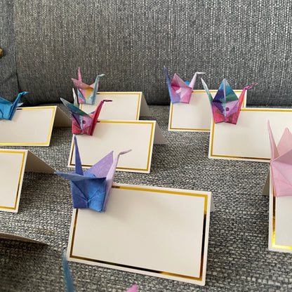 Origami crane place cards in watercolour galaxy paper, view 3