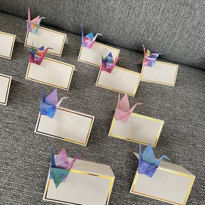 Origami crane place cards in watercolour galaxy paper, view 4