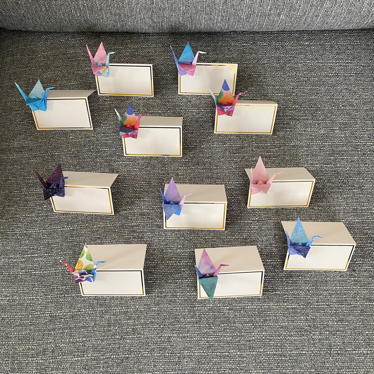 Origami crane place cards in watercolour galaxy paper, view 2