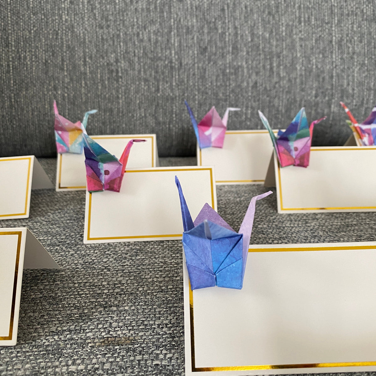 Origami crane place cards in watercolour galaxy paper, view 5