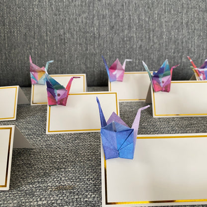 Origami crane place cards in watercolour galaxy paper, view 5