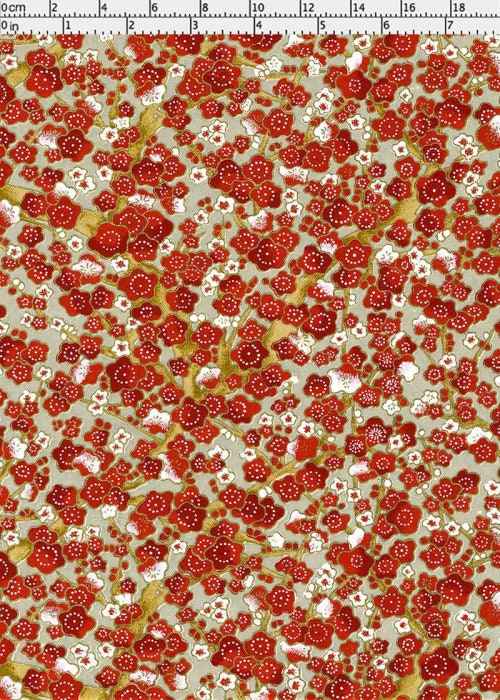 Floral fabric pattern with red, white, and green colors on a neutral background