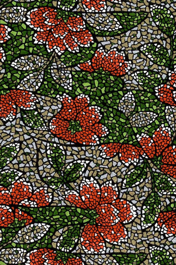 Patterned chiyogami paper with red flowers and green leaves on a textured background