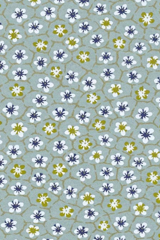 Pattern of small flowers on a light blue background
