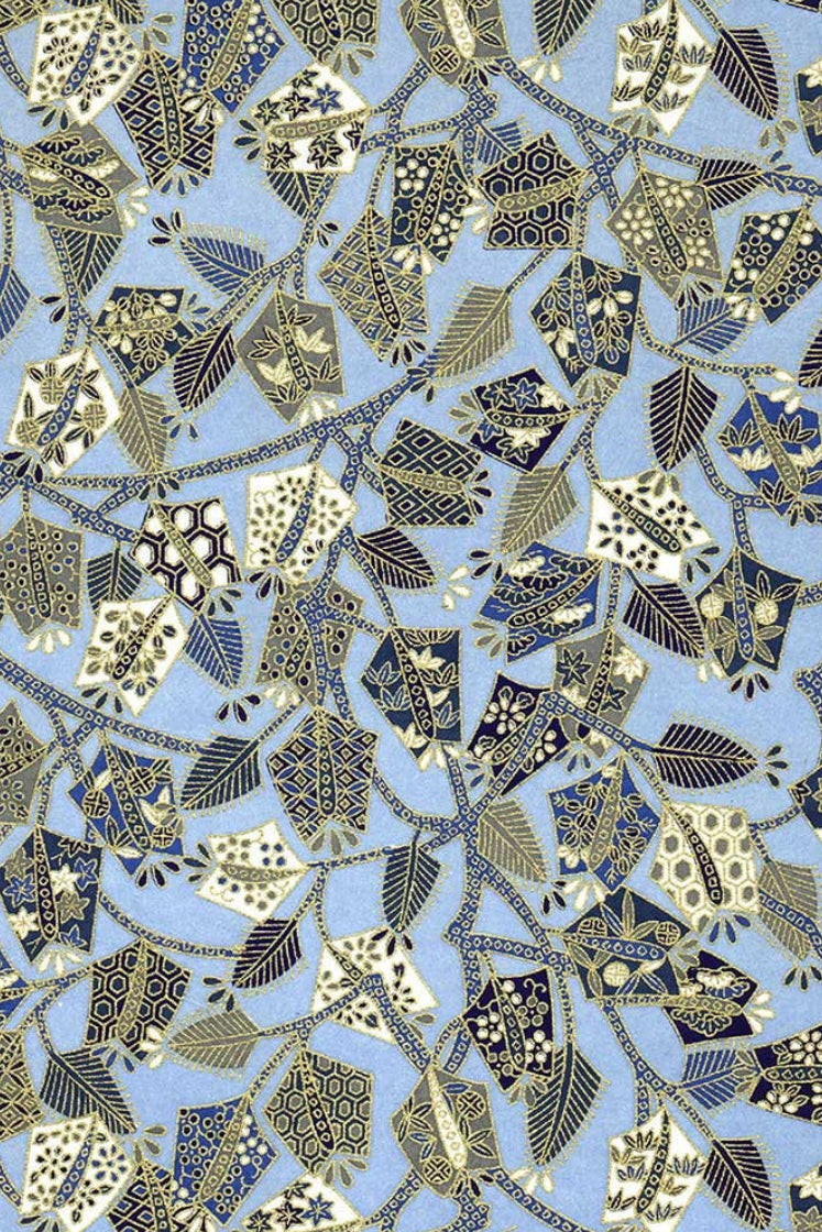Patterned  chiyogami paper with geometric shapes on a blue background