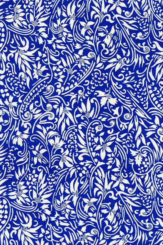 Chiyogami paper with floral pattern with white flowers on a blue background