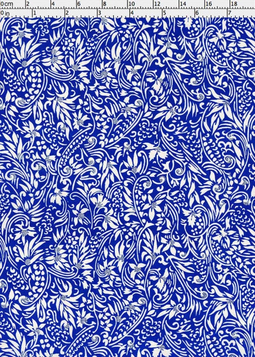 Floral pattern chiyogami paper with blue and white colors and a ruler for scale