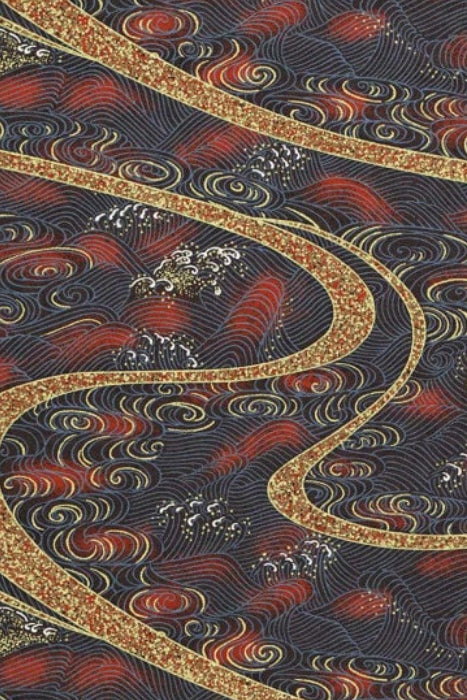 Decorative chiyogami paper with intricate wave and floral pattern on a dark background