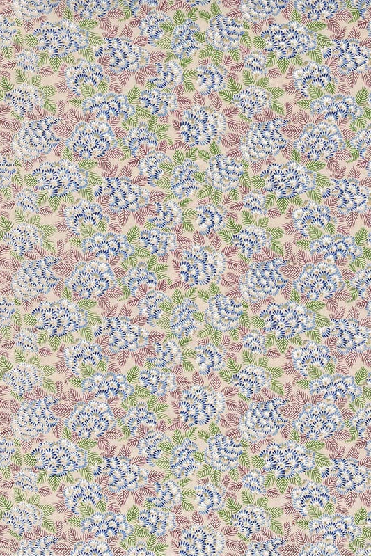 Patterned  chiyogami paper with blue floral design on a pink background