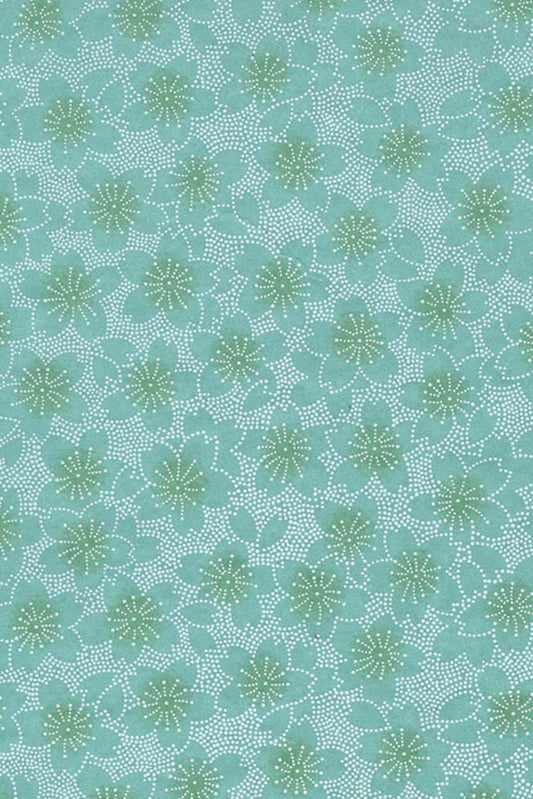 Teal fabric with a subtle pattern of green shapes on a textured background