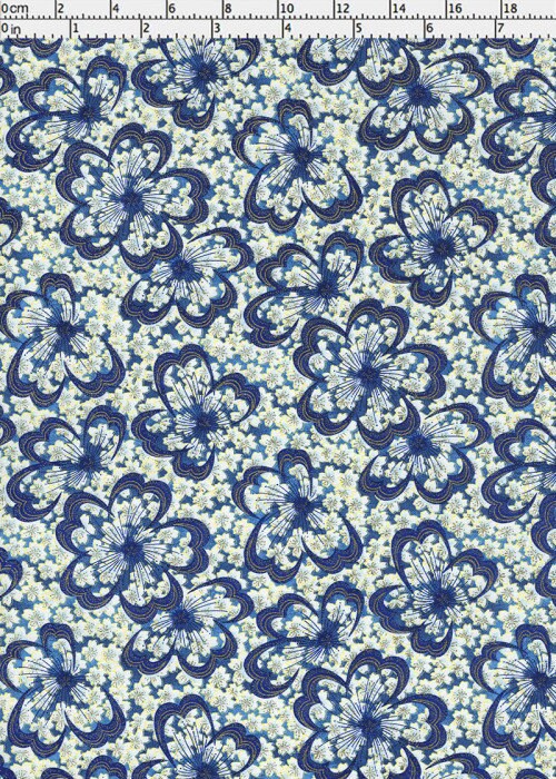 Chiyogami paper with Pattern of blue butterflies on a light background with a ruler for scale