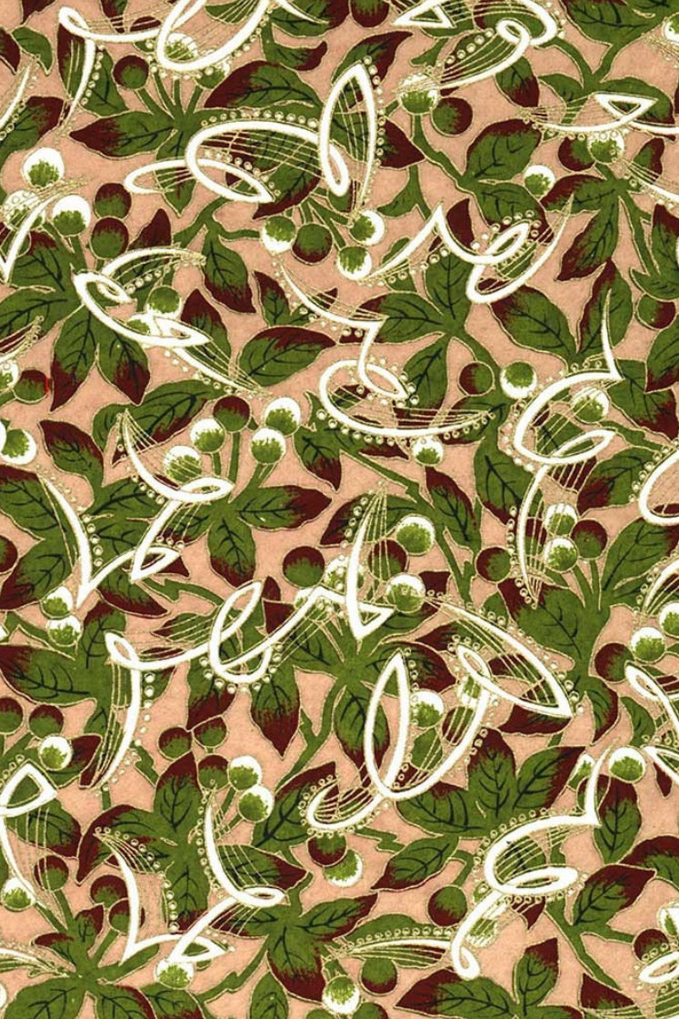 Patterned  chiyogami paper with green leaves and white butterfly designs on a beige background