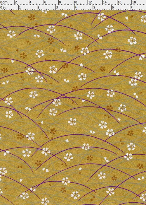 Chiyogami paper with floral pattern on a yellow background, measured against a ruler.