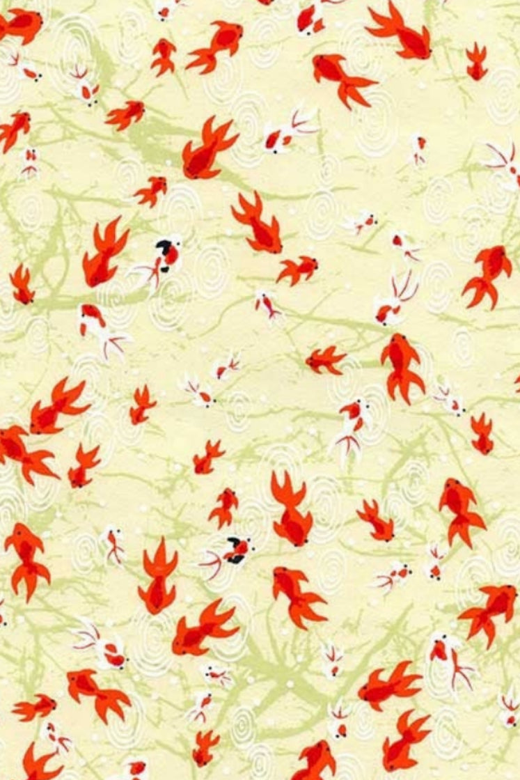 Chiyogami paper with Pattern of red fish on a light yellow background