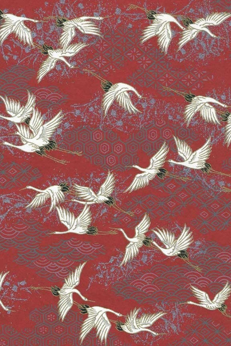 Pattern of white birds on a red background with decorative elements