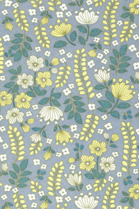 Floral pattern with yellow and white flowers on a blue background