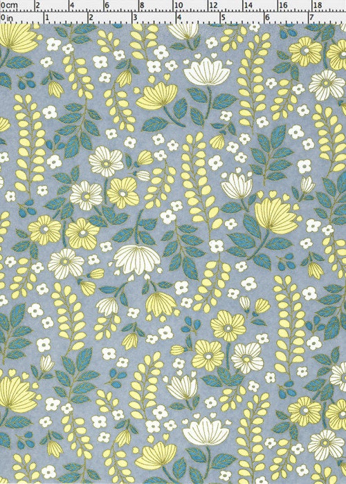 Floral pattern with yellow and white flowers on a blue background