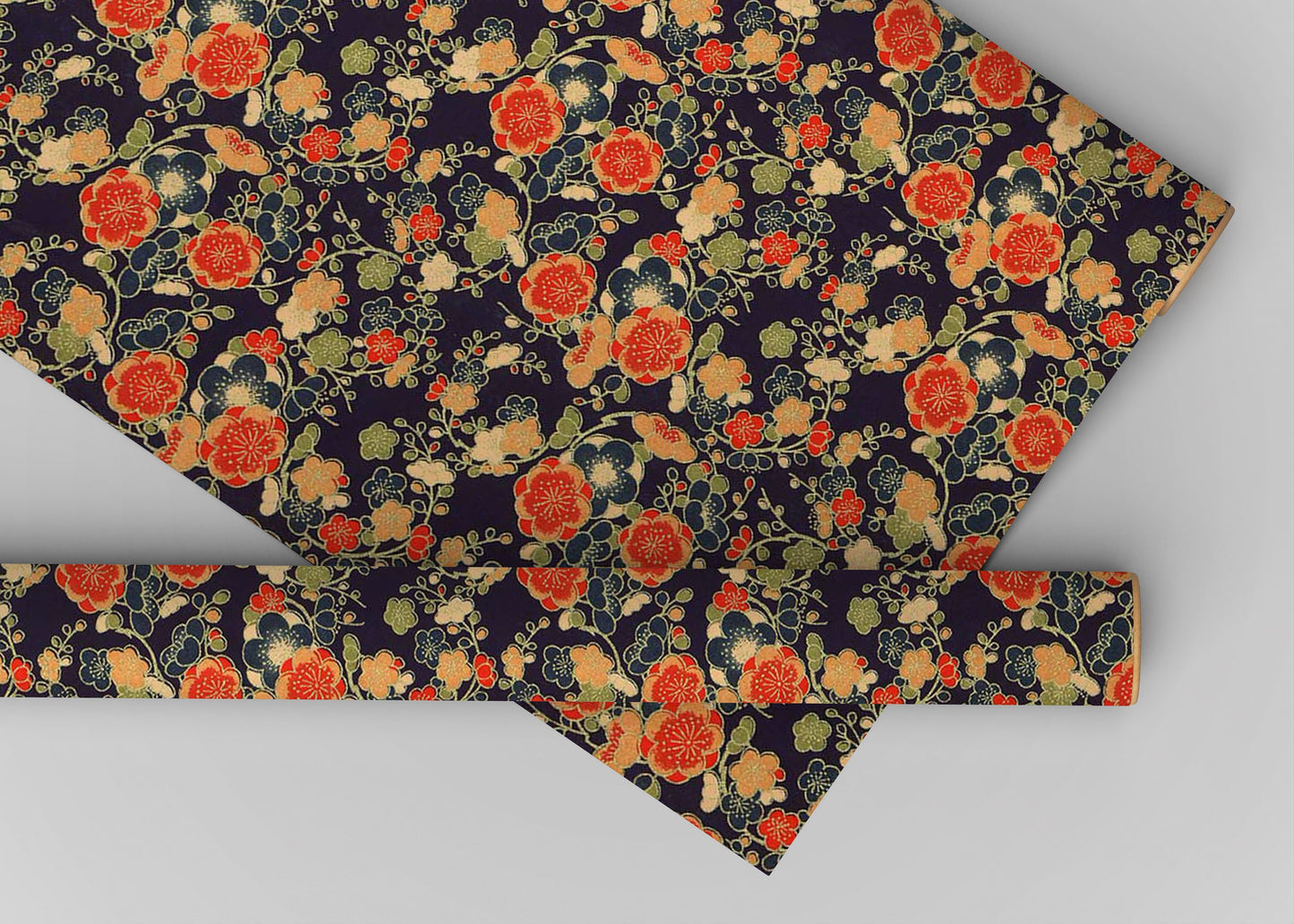 Floral patterned fabric with red, orange, and green flowers on a dark background