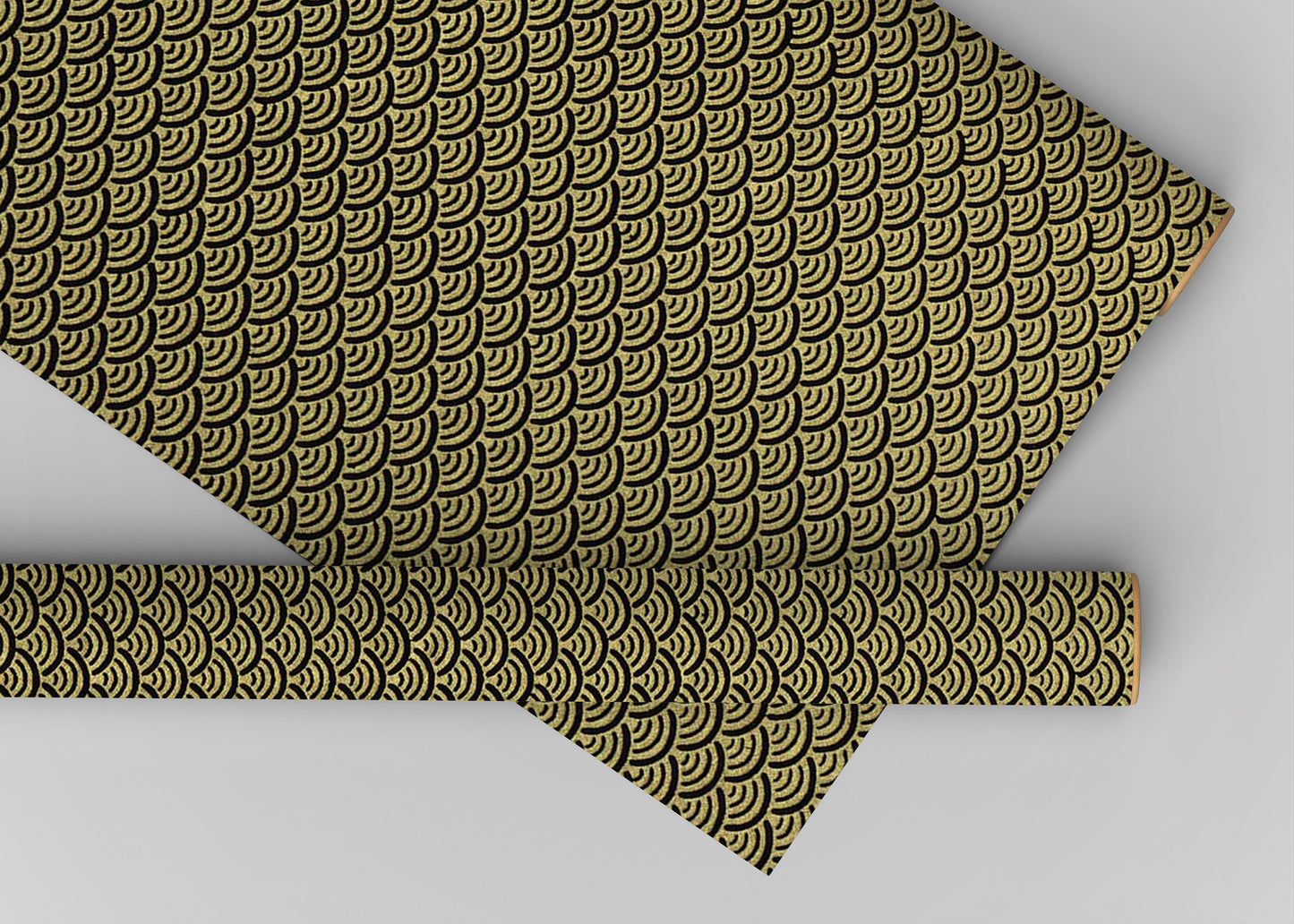 Gold patterned fabric on a light gray background