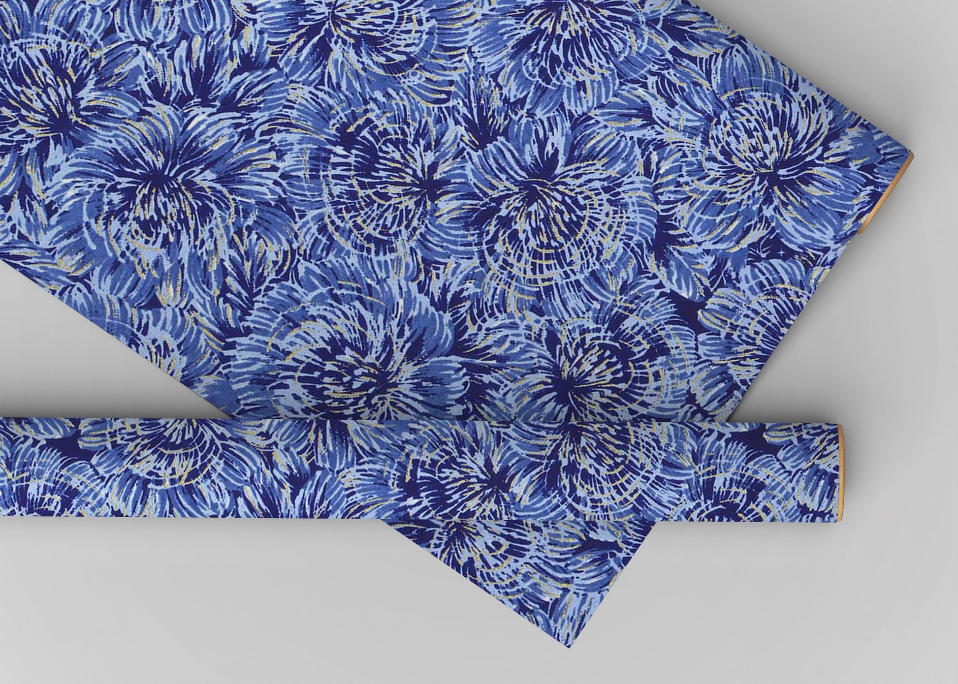 Blue floral patterned fabric on a gray background