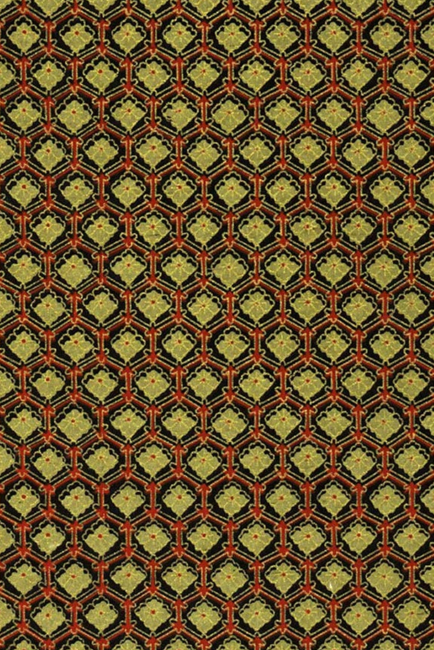 Patterned chiyogami paper with geometric design on a black background