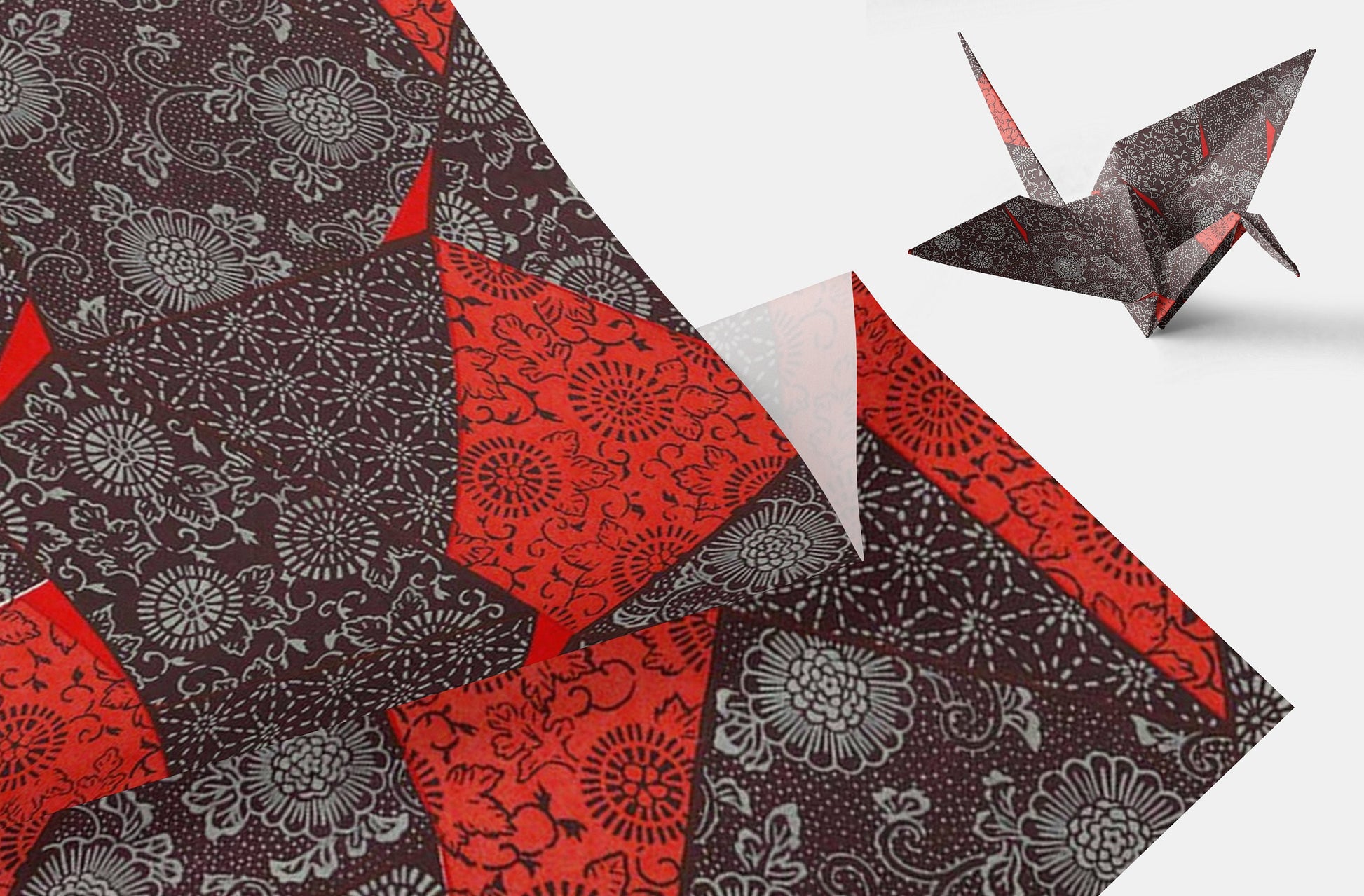 Chiyogami paper with red and black pattern, folded and an origami crane made from it.